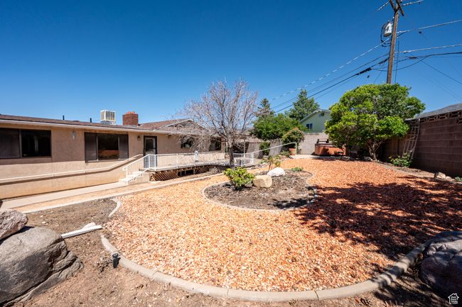 View of fenced backyard | Image 42