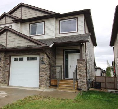 14940 102 A St, Home with 3 bedrooms, 3 bathrooms and 2 parking in Grande Prairie AB | Image 1