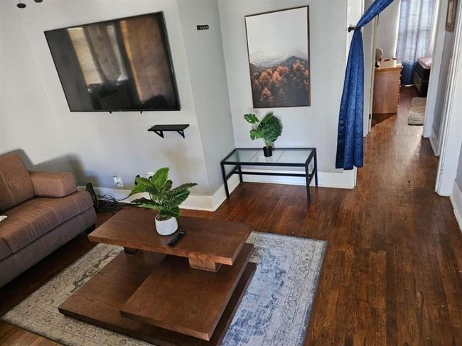 Charming two-bedroom unit on the second floor, nestled in the peaceful back building. | Image 7