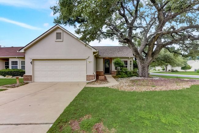 Garage: "Keep your vehicles safe and sound in the spacious two-car garage with extra parking. ???? #PracticalLiving #GarageGoals" | Image 10
