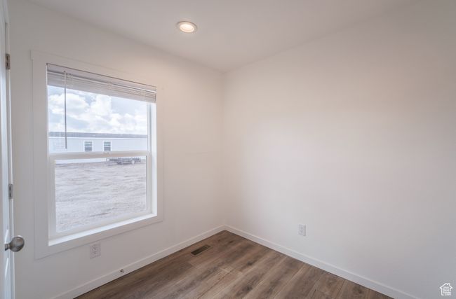 Empty room featuring recessed lighting, visible vents, baseboards, and wood finished floors | Image 14