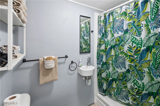 Bathroom featuring ornamental molding and walk in shower | Image 21