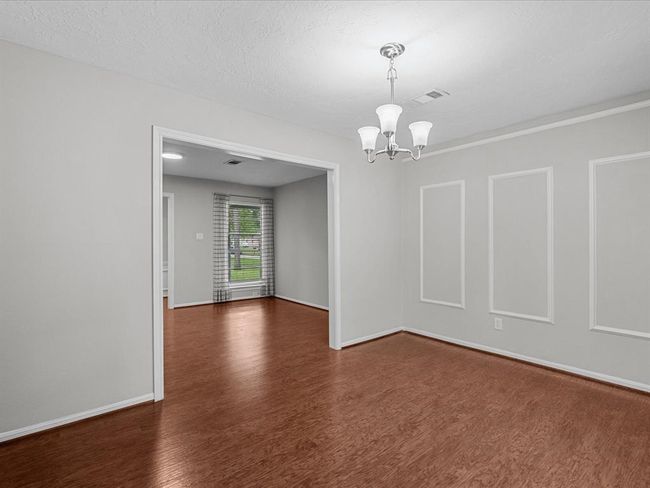 Formal dining and formal living just off to the side of the kitchen | Image 10
