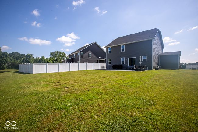 Large backyard with plenty of space to relax or play | Image 33
