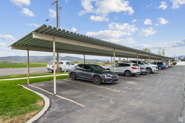 Covered parking lot with a mountain view | Image 26