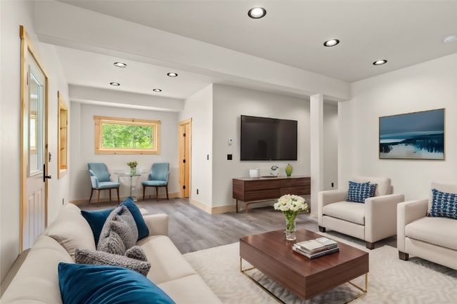 Virtual staged downstairs Living space | Image 37