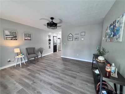 Living room with new LVP flooring | Image 3