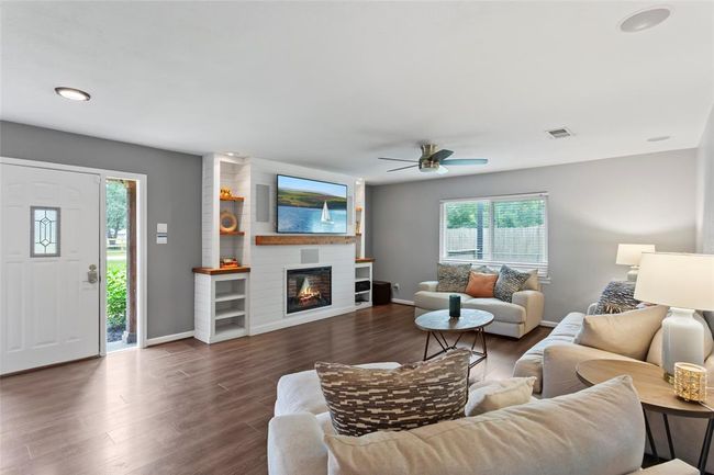 Bright and sunny with cozy fireplace... | Image 5