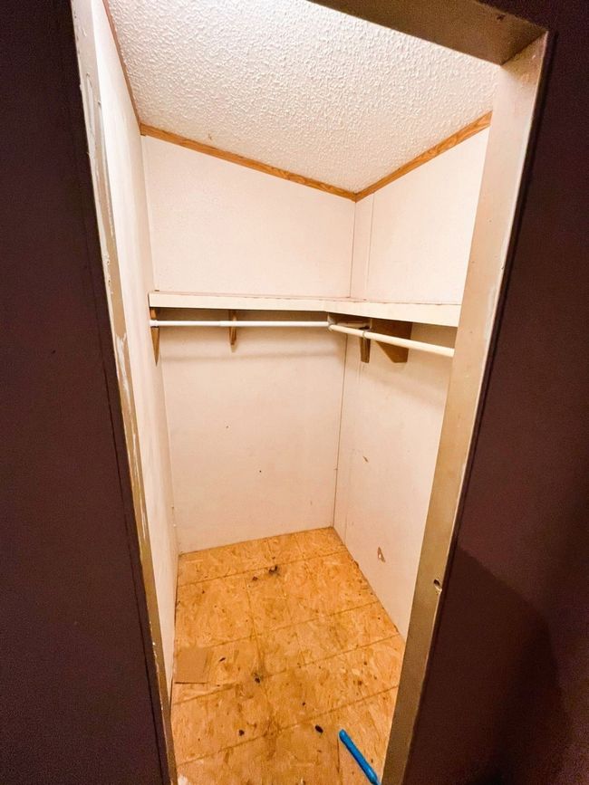 Walk in closet featuring light tile patterned flooring | Image 23