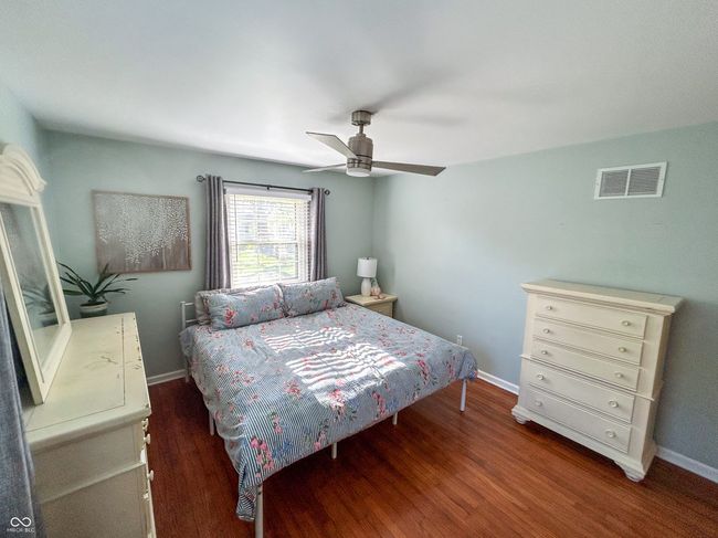 Large primary bedroom, featuring hardwood floors | Image 17