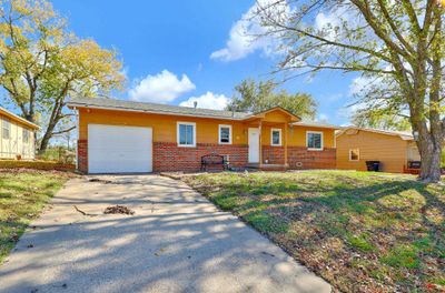 Ranch-style house featuring a garage | Image 3