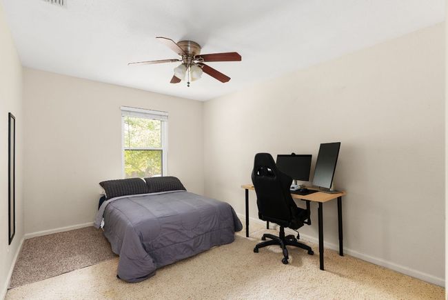 Bedroom with baseboards and ceiling fan | Image 24
