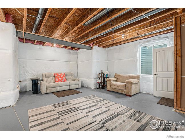 unfinished space in basement with wet bar rough-in | Image 21