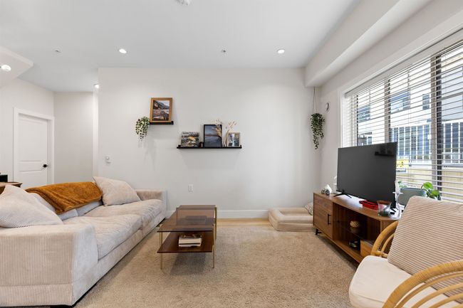 Living room featuring recessed lighting, baseboards, and wood finished floors | Image 9
