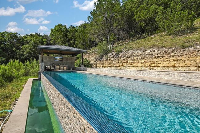 View of pool featuring a gazebo | Image 33