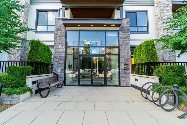 View of exterior entry with stone siding | Image 4