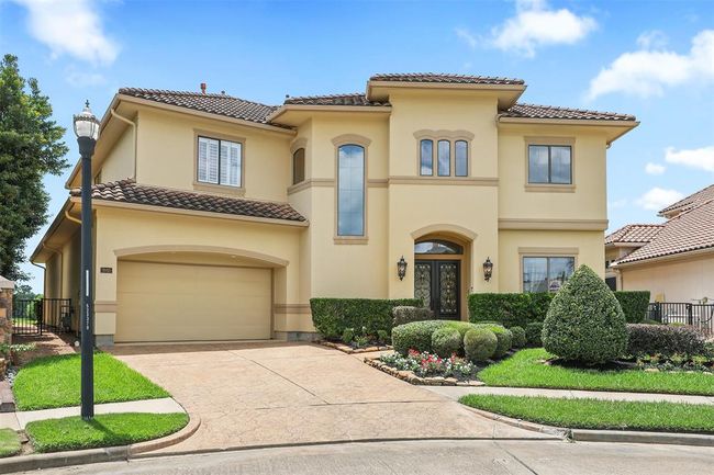 Located at the end of the street on a cul-de-sac and offering a three car tandem garage. | Image 6