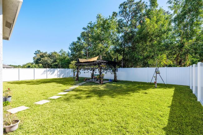 5850 Se Sky Blue Circle, House other with 5 bedrooms, 3 bathrooms and null parking in Stuart FL | Image 26