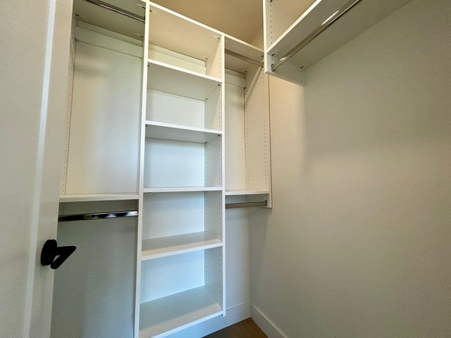 View of spacious closet | Image 16