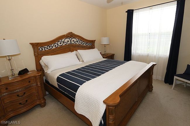 Bedroom with carpet | Image 12