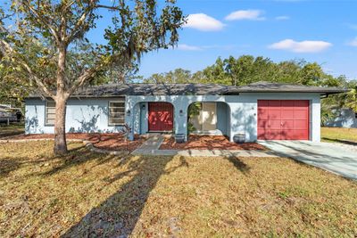 4511 Lakeshore Avenue, House other with 3 bedrooms, 2 bathrooms and null parking in Spring Hill FL | Image 1