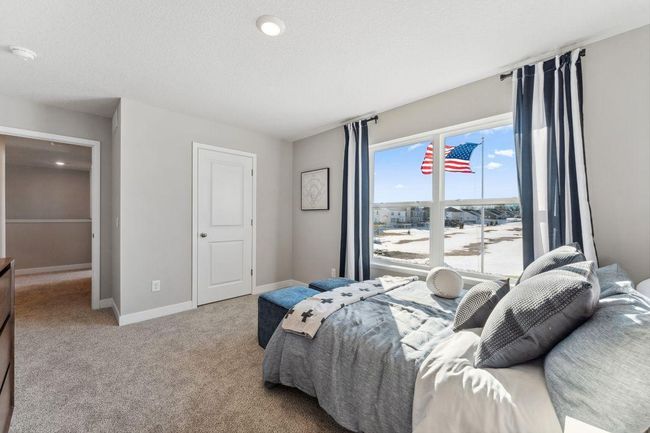 Another view of the bedroom. Photo of model home, colors and finishes will vary. | Image 33