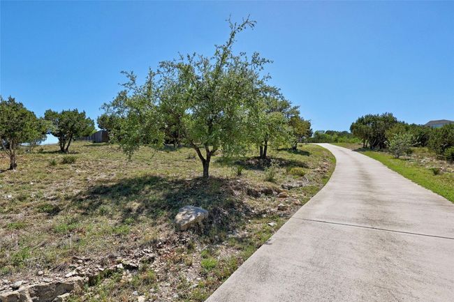 This private driveway takes you to a gorgeous hill country home! | Image 34