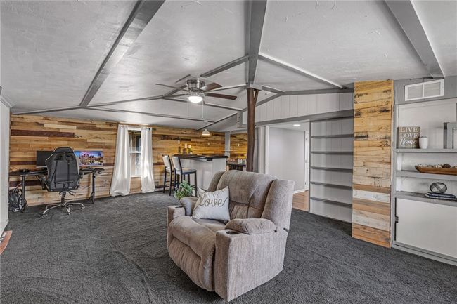 Family room is a great space to curl up with a book. | Image 12