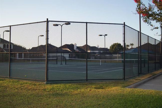 Sunrise Lakes in Pearland, TX features great community amenities including basketball courts and tennis courts — perfect for staying active just steps from home! | Image 39