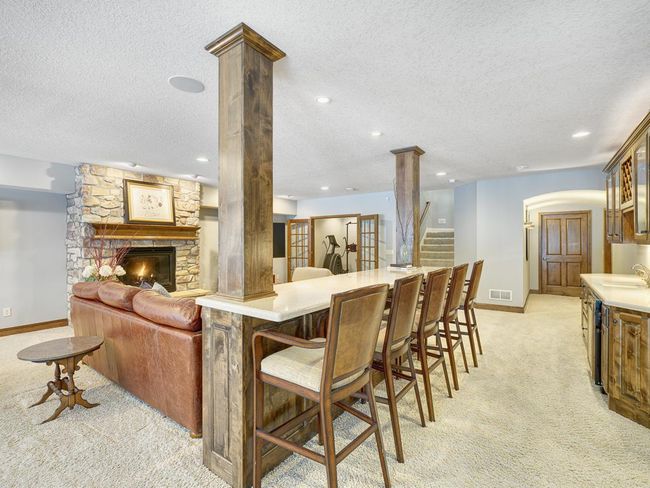 The island by the wet bar is great for entertaining! | Image 28