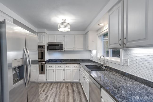 Kitchen with all appliances | Image 8