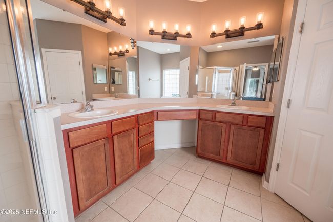 11760 Huckleberry Trl E, House other with 4 bedrooms, 2 bathrooms and null parking in MACCLENNY FL | Image 19