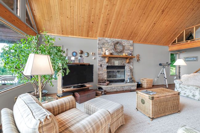 stone faced wood burning fireplace and hand crafted oak mantle | Image 18
