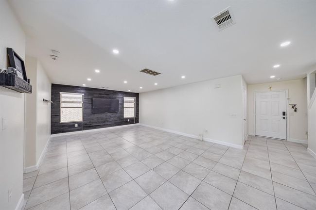 Recessed ceiling lights provide bright, even illumination throughout the space. | Image 12