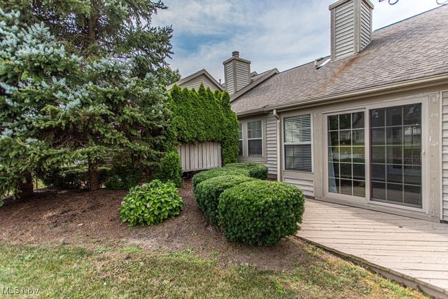 View of yard featuring a deck | Image 6