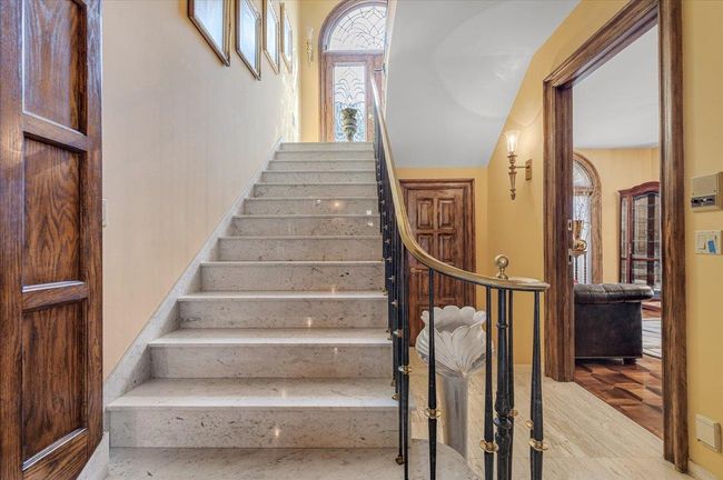 View of staircase leading to second floor | Image 9