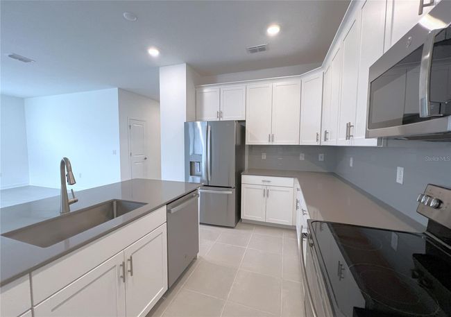 4048 Redbridge Loop, House other with 4 bedrooms, 3 bathrooms and null parking in DAVENPORT FL | Image 11
