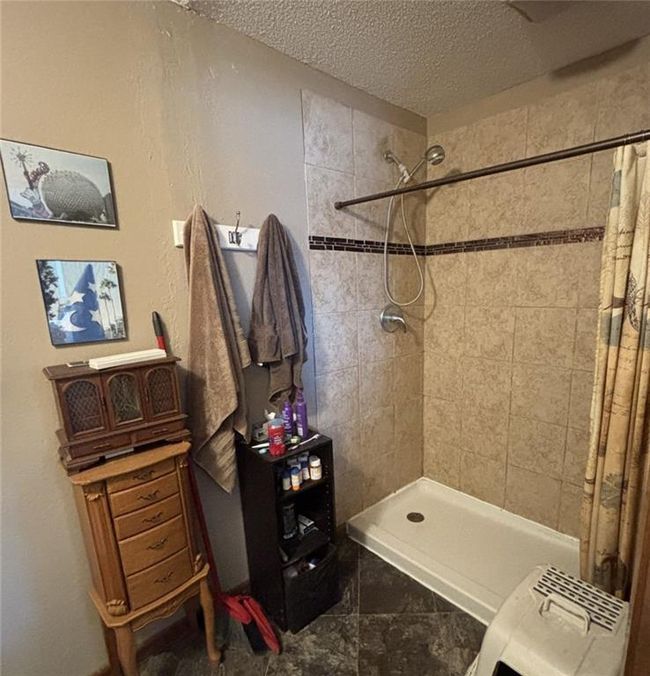 Bathroom with tiled walk-in shower | Image 24