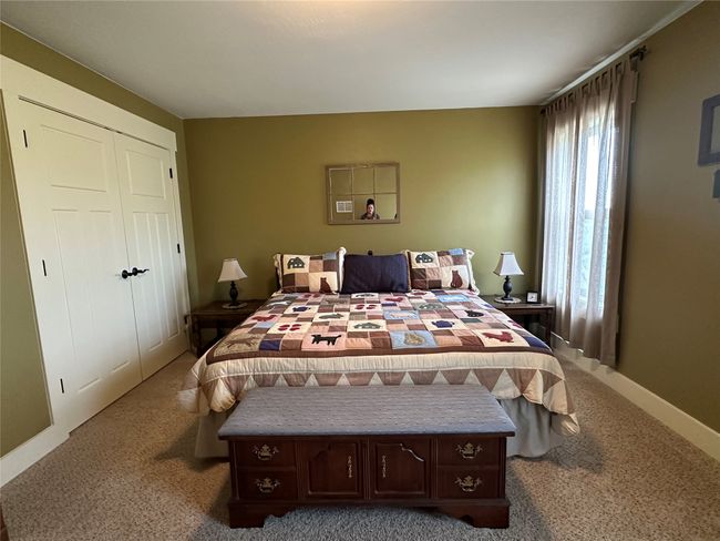 Bedroom with carpet and a closet | Image 20