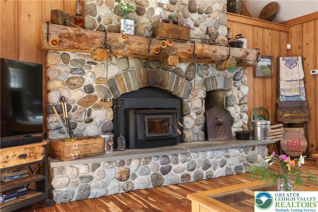 To the Absolutely Magnificent Floor to Ceiling Stone Work & Cozy Wood Burning Stove | Image 30
