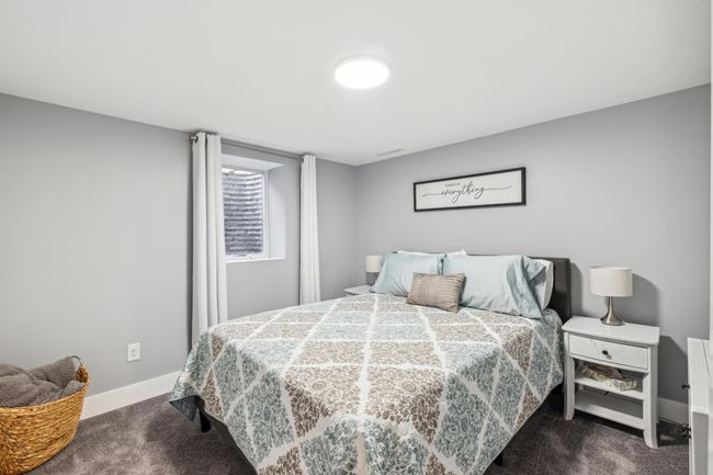 Lower-level bedroom w/ egrees window | Image 14