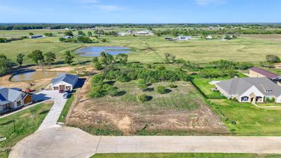 Birds eye view of property with a water view | Image 1