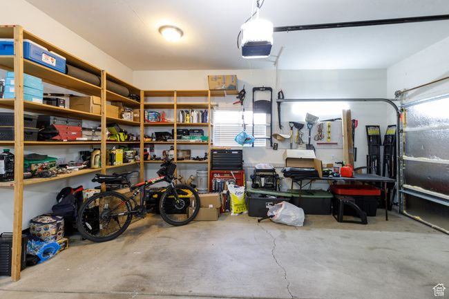 Garage featuring a garage door opener | Image 23