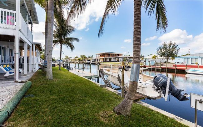 12277 Boat Shell Dr, House other with 3 bedrooms, 3 bathrooms and 3 parking in MATLACHA ISLES FL | Image 7