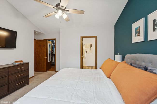 The primary bedroom features a private ensuite just steps away for added comfort and convenience | Image 23