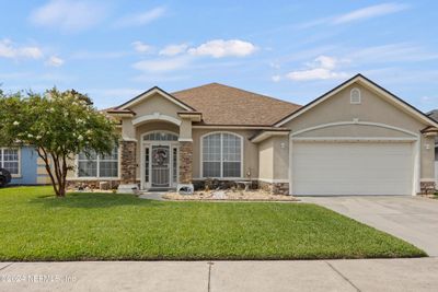 9623 Woodstone Mill Drive, House other with 4 bedrooms, 3 bathrooms and null parking in Jacksonville FL | Image 1