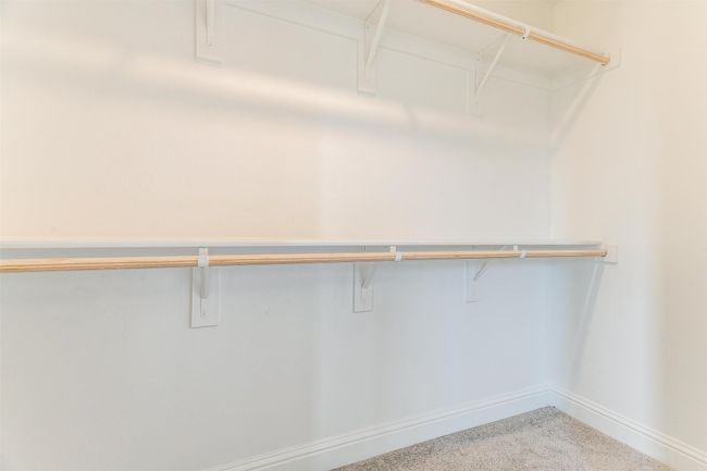 Walk in closet with carpet | Image 20