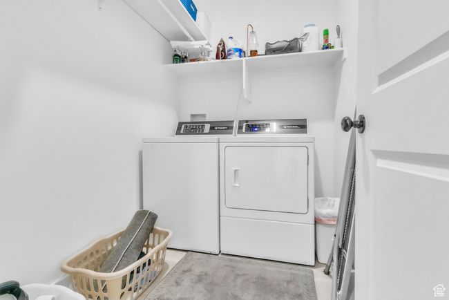Washroom featuring washing machine and dryer | Image 24