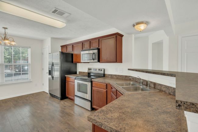 Notice the matching stainless steel appliances! | Image 8