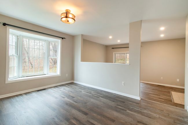 Dining room is open to both the kitchen and living room | Image 9